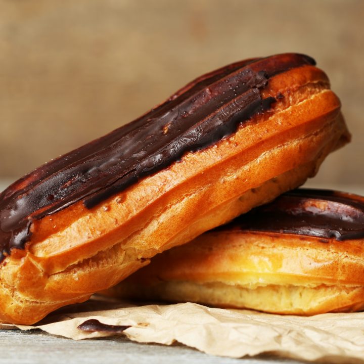Eclairs with brown chocolate glaze
